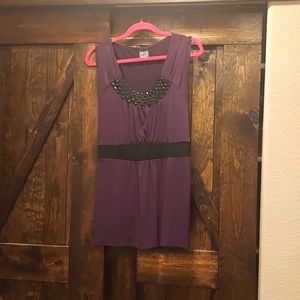 Purple sleeveless blouse
